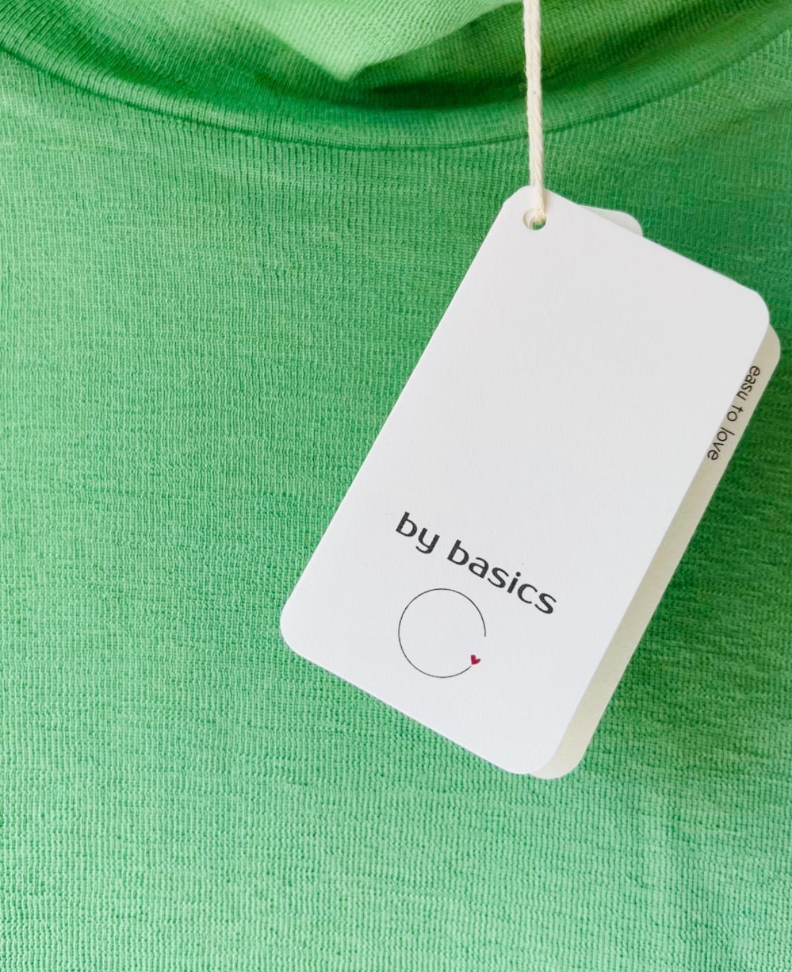 Pure merino roll-neck pistacio green