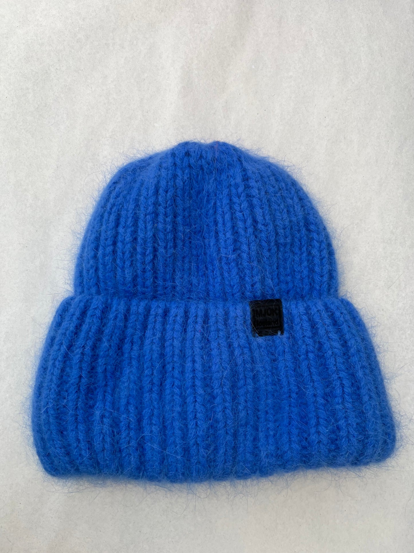 Hand-knit angora hue