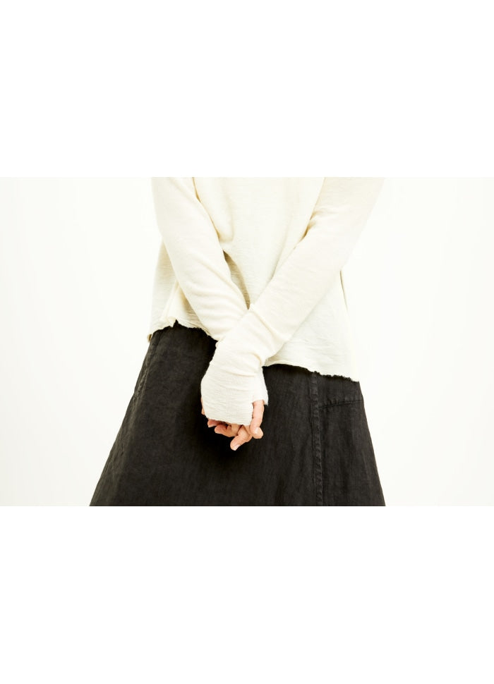 High boat neck merino blouse with slits and sleeves with thumb-holes