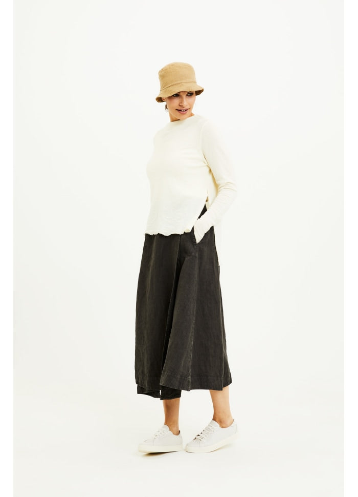 High boat neck merino blouse with slits and sleeves with thumb-holes